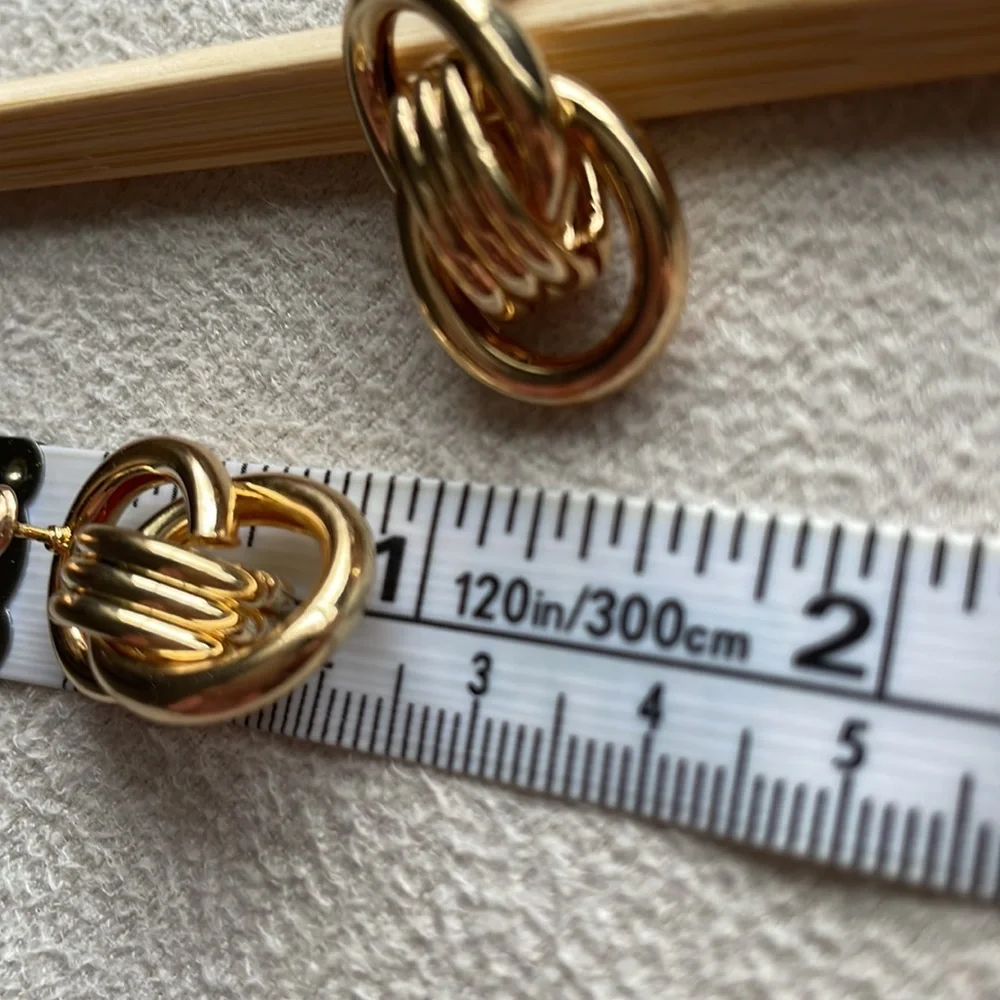 Gold double knot stud earrings